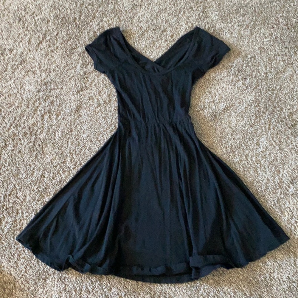 Black stretch dress size S. Cut out in back